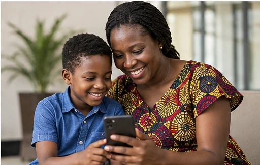 African parent reviewing school information on a smartphone at home